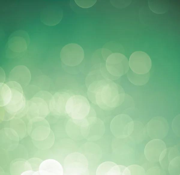 Gröna bokeh ljus bakgrund — Stockfoto