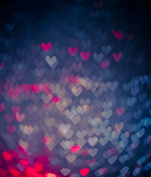 Blaue und rosa Herzen bokeh als Hintergrund — Stockfoto