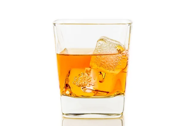 Whiskey in glass with ice on white background — Stock Photo, Image