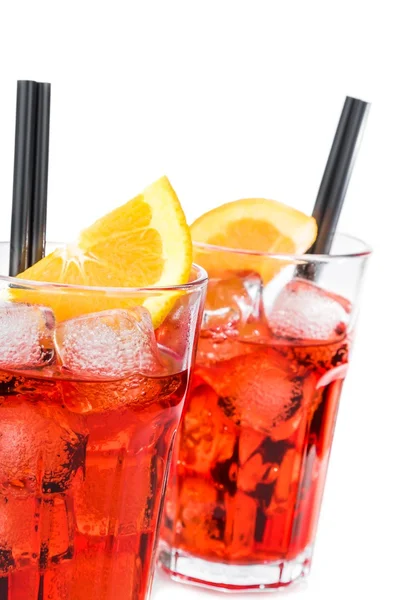 Two glasses of spritz aperitif aperol cocktail with orange slices and ice cubes isolated on white — Stock Photo, Image