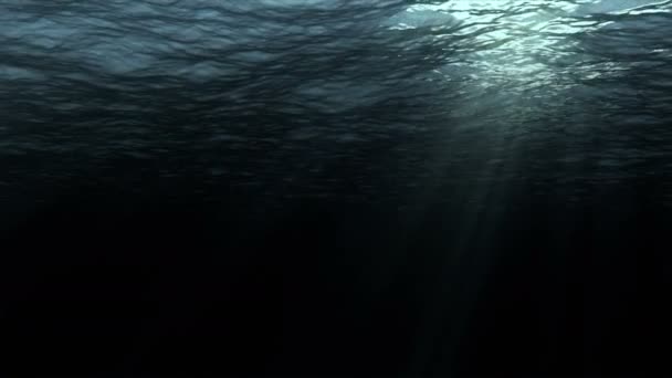 Vysoce kvalitní naprosto bezešvá smyčka digitální animace hlubokého oceánu vlny z podvodní pozadí, světelné paprsky zářící skrze