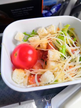 MOSCOW - 06, 2019: food on the plane on an Aeroflot flight pork with rice during flight, Aeroflot is largest airline in Russia