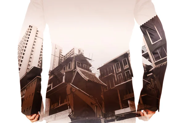 ビジネスの男性と c 市のパワー クレーンの二重露光 — ストック写真