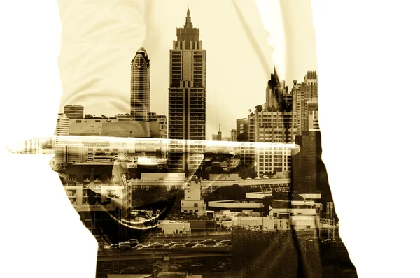 Çift pozlama el işadamı ve şehir kurma