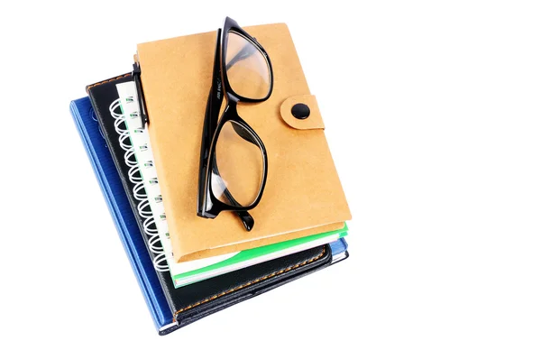 Bücherstapel mit Brille — Stockfoto