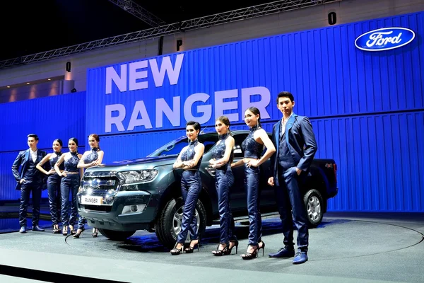 BANGKOK - March 26 : New Ford Ranger, Pick up truck, with male a — Stock Photo, Image