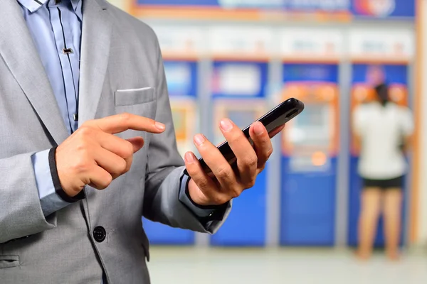 Businesssman using Mobile Banking Application on Smartphone — Stock Photo, Image