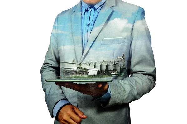 Double Exposure of Businessman and Silo warehouse — Stock Photo, Image