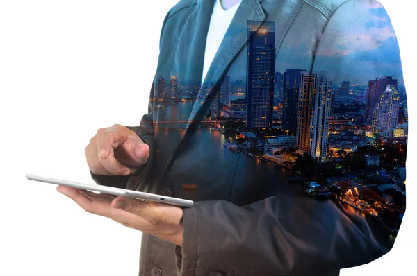 Double exposure of city and Businessman use Tablet device — Stock Photo, Image