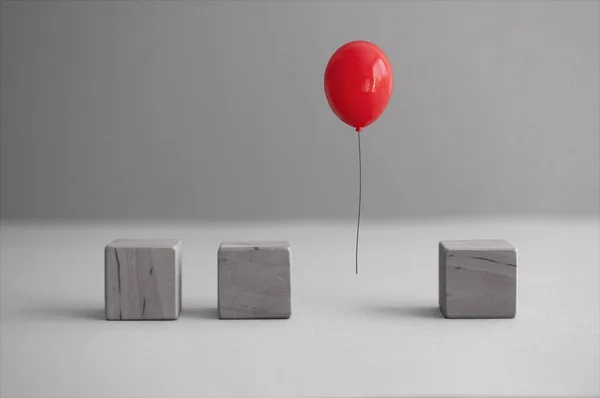 Red Balloon Mid Air Amongst Wooden Square Cubes — Stock Photo, Image
