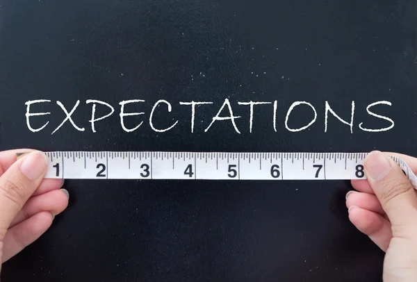 Measuring expectations — Stock Photo, Image