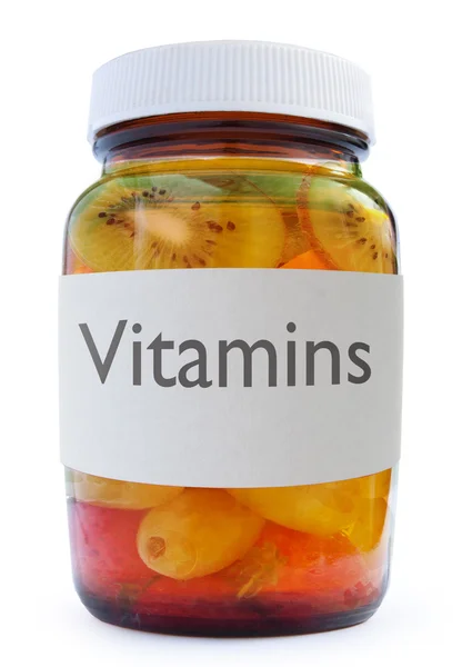 Баночка с витаминами — стоковое фото