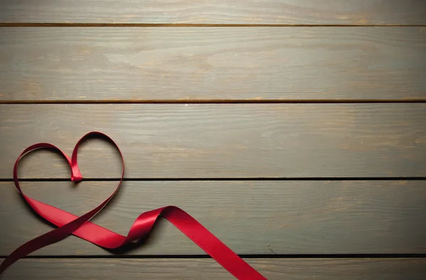 Heart shaped red ribbon — Stock Photo, Image