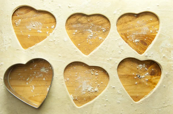 Pastry background with heart shapes — Stock Photo, Image