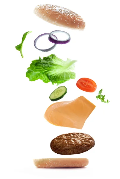 Létající ingredience hamburger — Stock fotografie