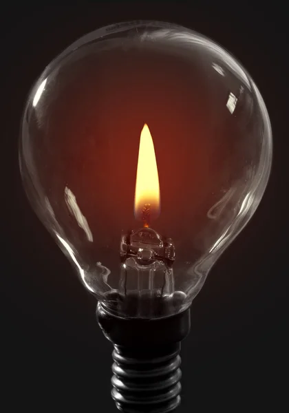 Candle flame light bulb — Stock Photo, Image
