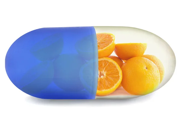 Close-up de uma pílula de vitamina c com laranjas — Fotografia de Stock