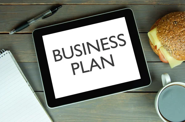 Computer tablet met Business Plan — Stockfoto