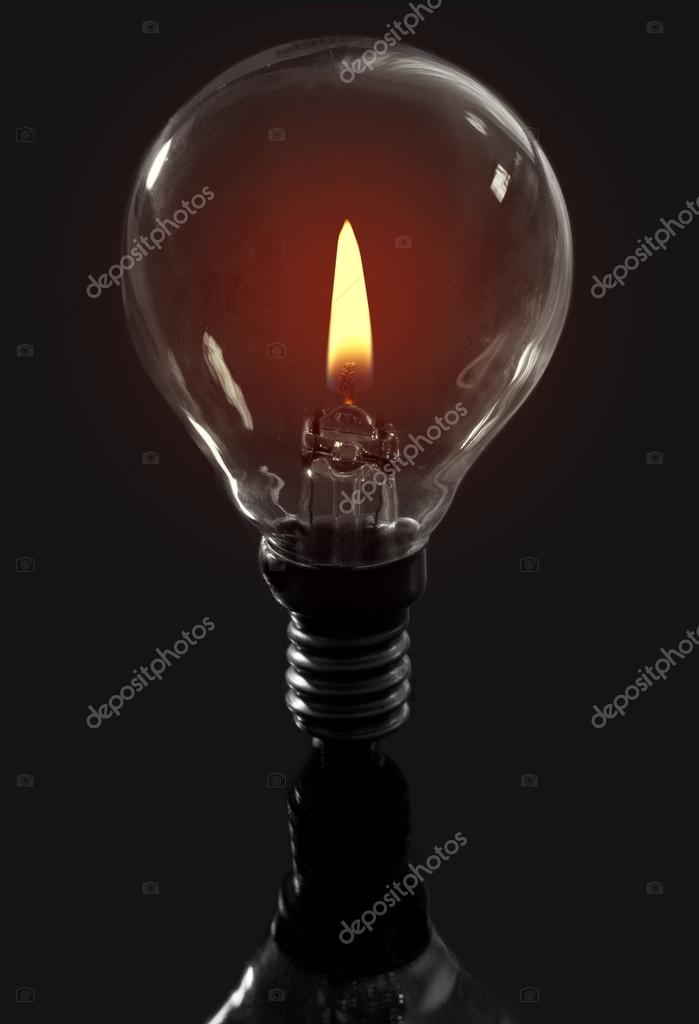 Candle flame light bulb Stock Photo by ©nupix 80054696