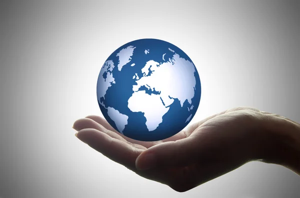 Hand innehav globe — Stockfoto