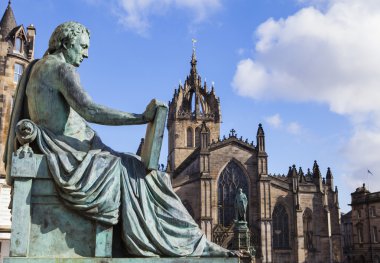 David Hume Statue and St Giles Cathedral in Edinburgh clipart