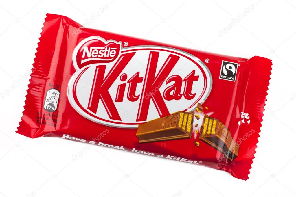 LONDON, UK - MAY 6TH 2016: An unopened Kit Kat chocolate bar manufactured by Nestle, pictured over a plain white background on 6th May 2016.