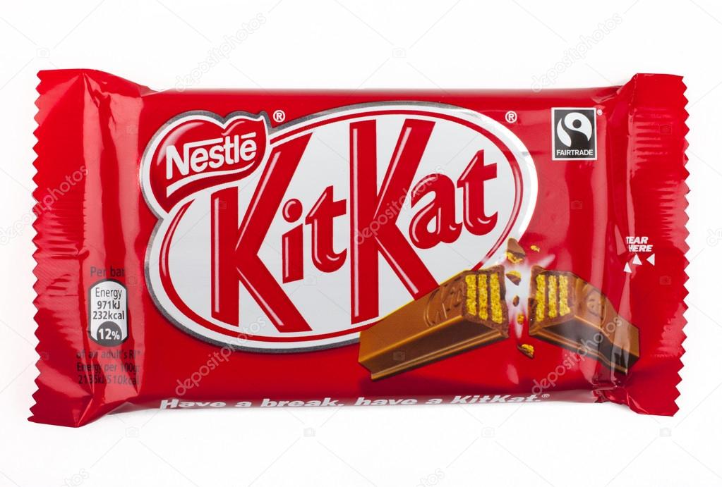 LONDON, UK - MAY 6TH 2016: An unopened Kit Kat chocolate bar manufactured by Nestle, pictured over a plain white background on 6th May 2016.