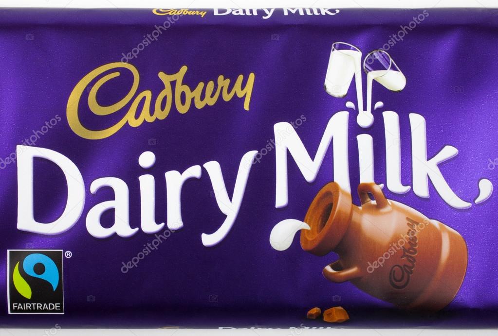 LONDON, UK - MAY 6TH 2016: An unopened Dairy Milk chocolate bar manufactured by Cadbury, pictured over a plain white background on 6th May 2016.