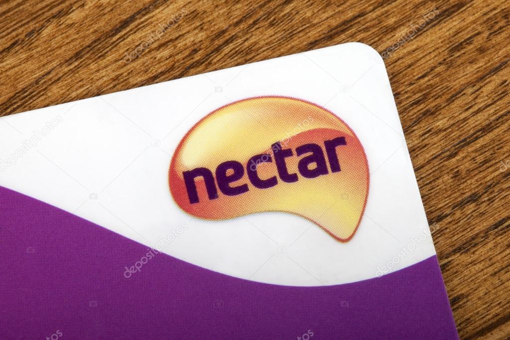 LONDON, UK - JUNE 13TH 2016: A close-up of the Nectar logo on a Sainsburys Nectar Points Card, on 13th June 2016.  The card allows customers to collect points as they shop and get money-off coupons in return.