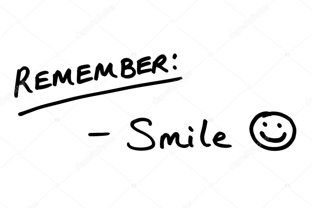 Remember - Smile, handwritten on a white background.