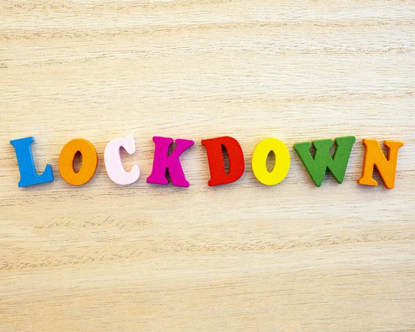 Word Lockdown Spelt Colourful Wooden Letters — Stock Photo, Image