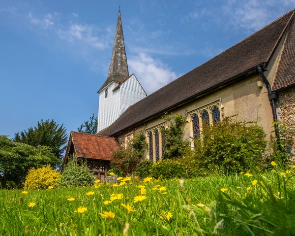 A view of the beautiful All Saints Church in the village of Stock in Essex, UK.