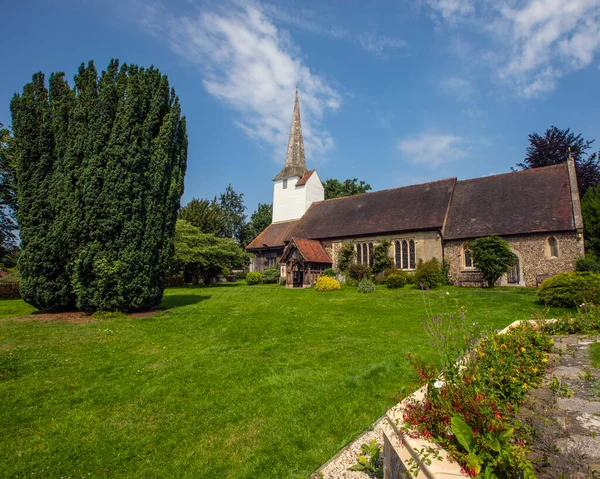 A view of the beautiful All Saints Church in the village of Stock in Essex, UK.