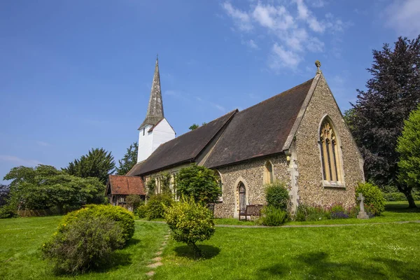 A view of the beautiful All Saints Church in the village of Stock in Essex, UK.
