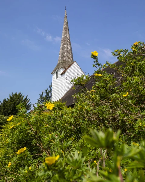 A view of the beautiful All Saints Church in the village of Stock in Essex, UK.