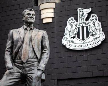 Newcastle upon Tyne, UK - August 29th 2021: The Sir Bobby Robson statue at Newcastle United Football Club stadium in Newcastle upon Tyne, UK. clipart