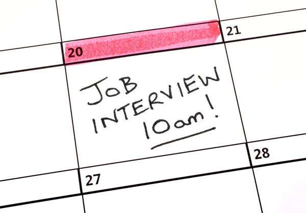 Job interview datum in een kalender — Stockfoto