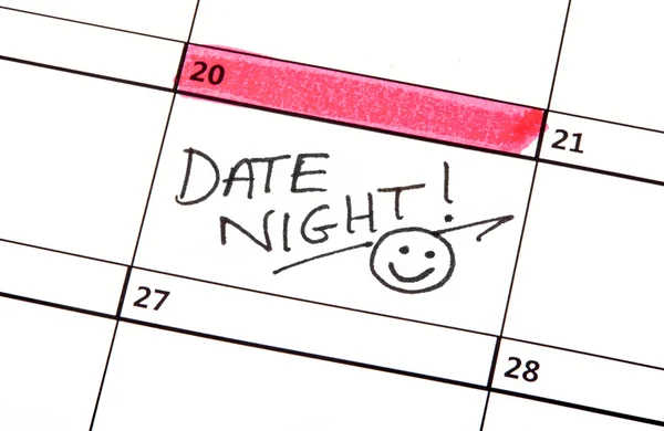 Ημερομηνία νύχτα γραμμένο σε ένα ημερολόγιο — Φωτογραφία Αρχείου