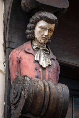 London, UK - July 29th 2025: Wooden carving on the exterior of the historic Dirty Dicks public house in London, UK.