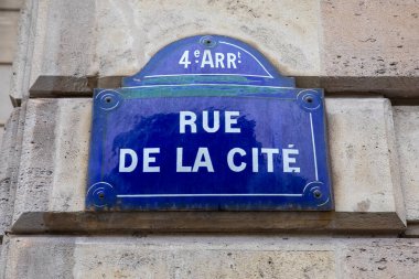 Paris, Fransa 'daki Rue de la Cite sokak tabelasına yakın çekim.