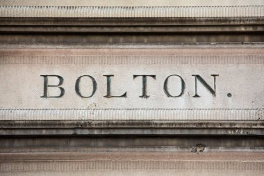 Bolton, İngiltere 'de eski Euston İstasyonu' nun 1960 'larda yıkılan eski localarından birine kazınmış bir kasabanın adı..
