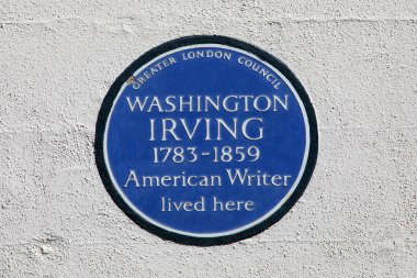 Londra, İngiltere - 3 Nisan 2025: Ünlü Amerikalı yazar Washington Irving 'in yaşadığı Londra, İngiltere' deki Argyll Caddesi 'nde mavi bir plaket.