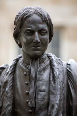 Londra, İngiltere - 3 Temmuz 2024: Londra 'daki Erkekler Hastanesi' nde Thomas Guy heykeli. Thomas Guy 1721 'de hastaneyi kuran bir İngiliz tüccar ve politikacıydı..