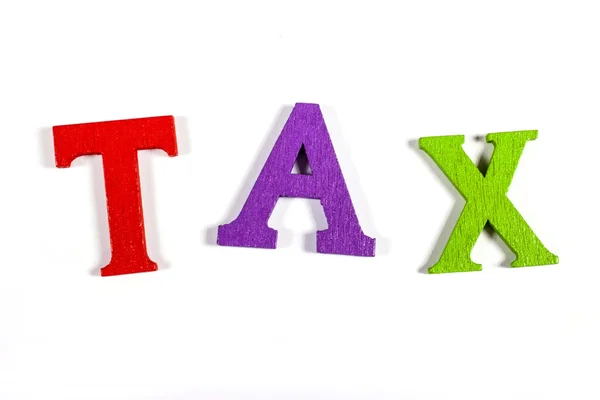 Färgade brev stavning skatt — Stockfoto