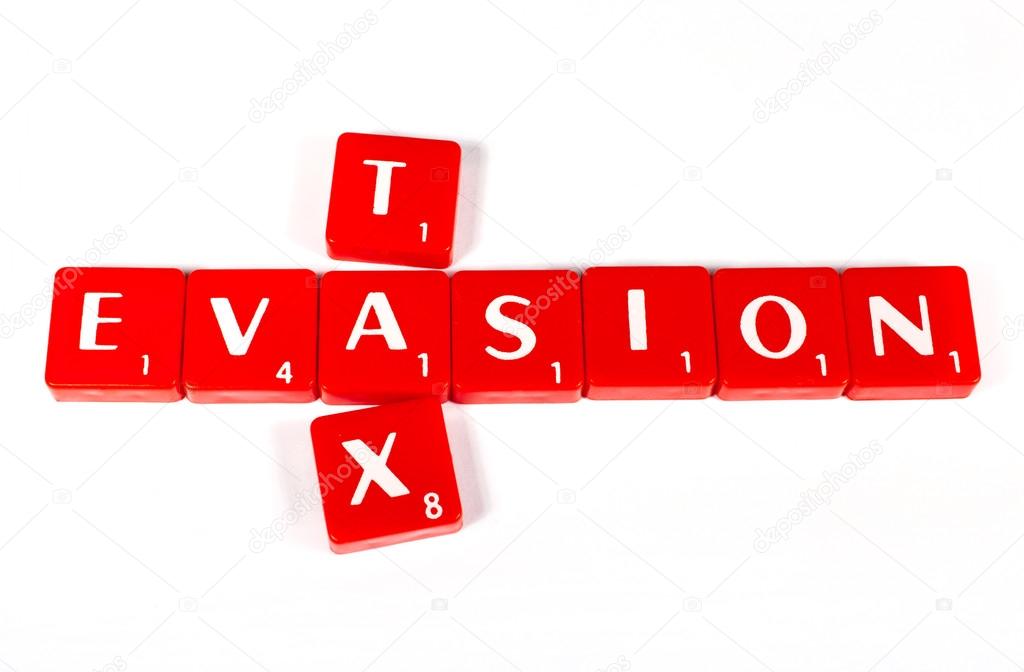 TAX EVASION spelt out with Letter Tiles