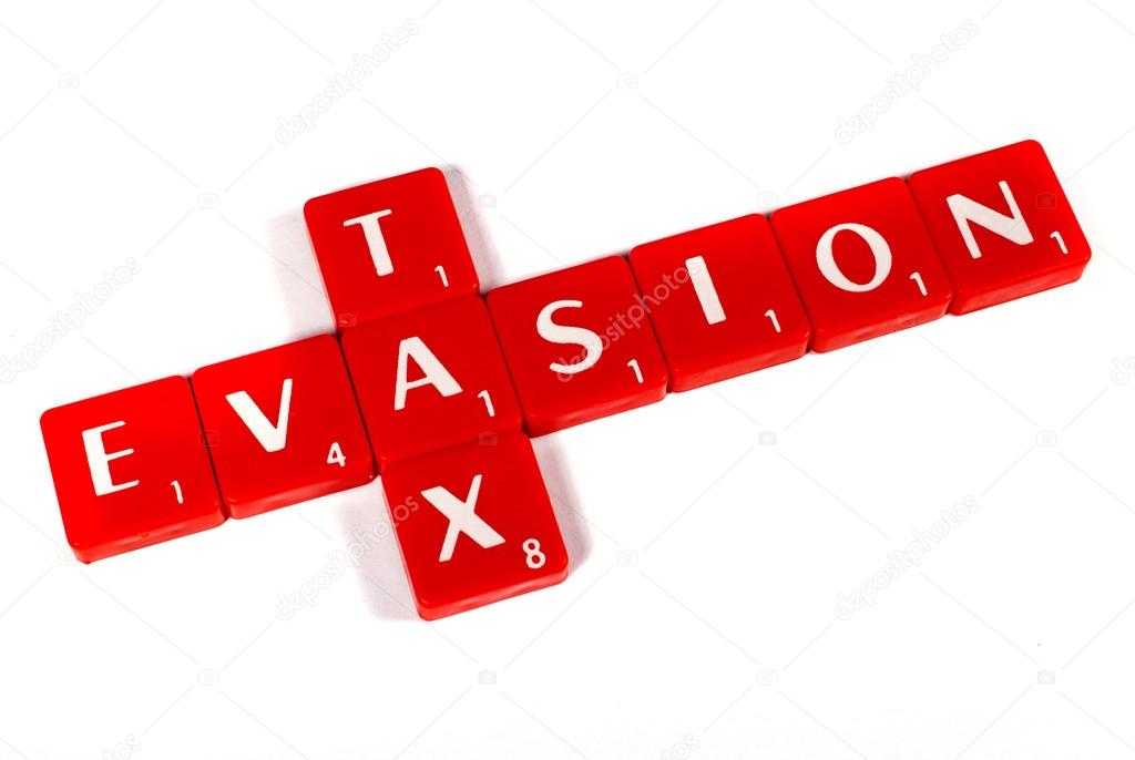 TAX EVASION spelt out with Letter Tiles