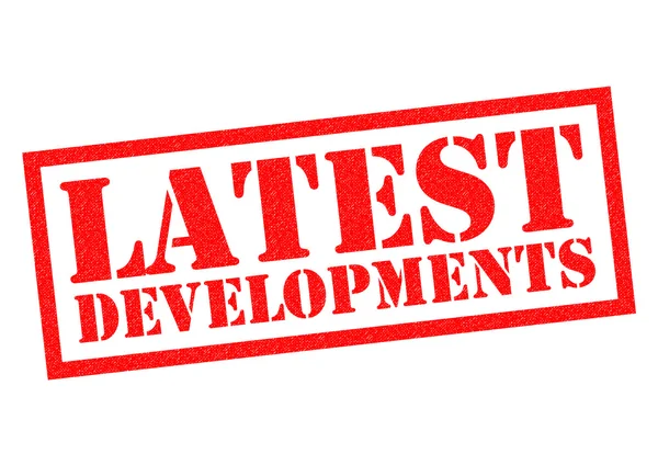 LATEST DEVELOPMENTS Rubber Stamp — Stock Photo, Image