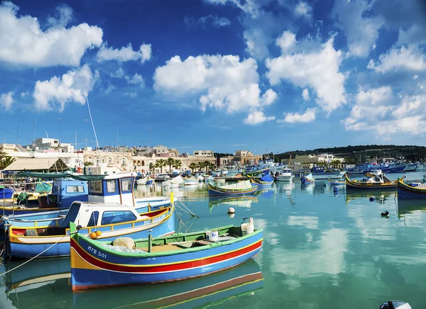 Marsaxlokk harbour and traditional mediterranean fishing boats i — Stock Photo, Image