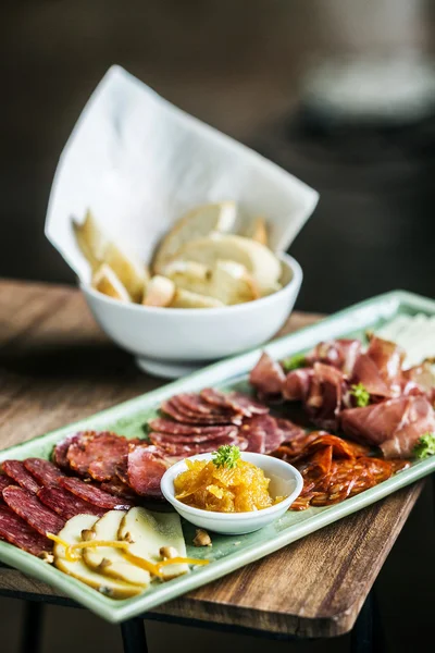 Spanish smoked meats ham and cheese platter starter dish — Stock Photo, Image