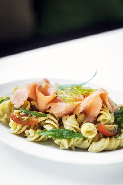 Smoked salmon organic tomato and basil fresh pasta salad — Stock Photo, Image